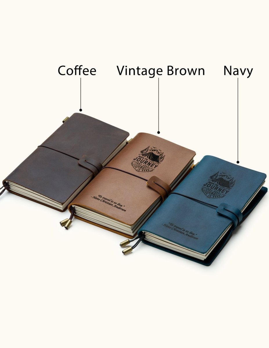 Three handcrafted leather travel notebooks in coffee, vintage brown, and navy colors, with elastic closure, custom engraving, and refillable design, perfect for journaling and gifts.