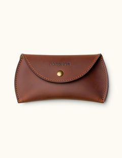 Custom leather case for Apple Magic Mouse with flap closure and hand-stitched edges