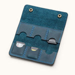 Open view of blue leather SD card holder with six hand-stitched slots, designed for storing memory cards or Switch game cartridges