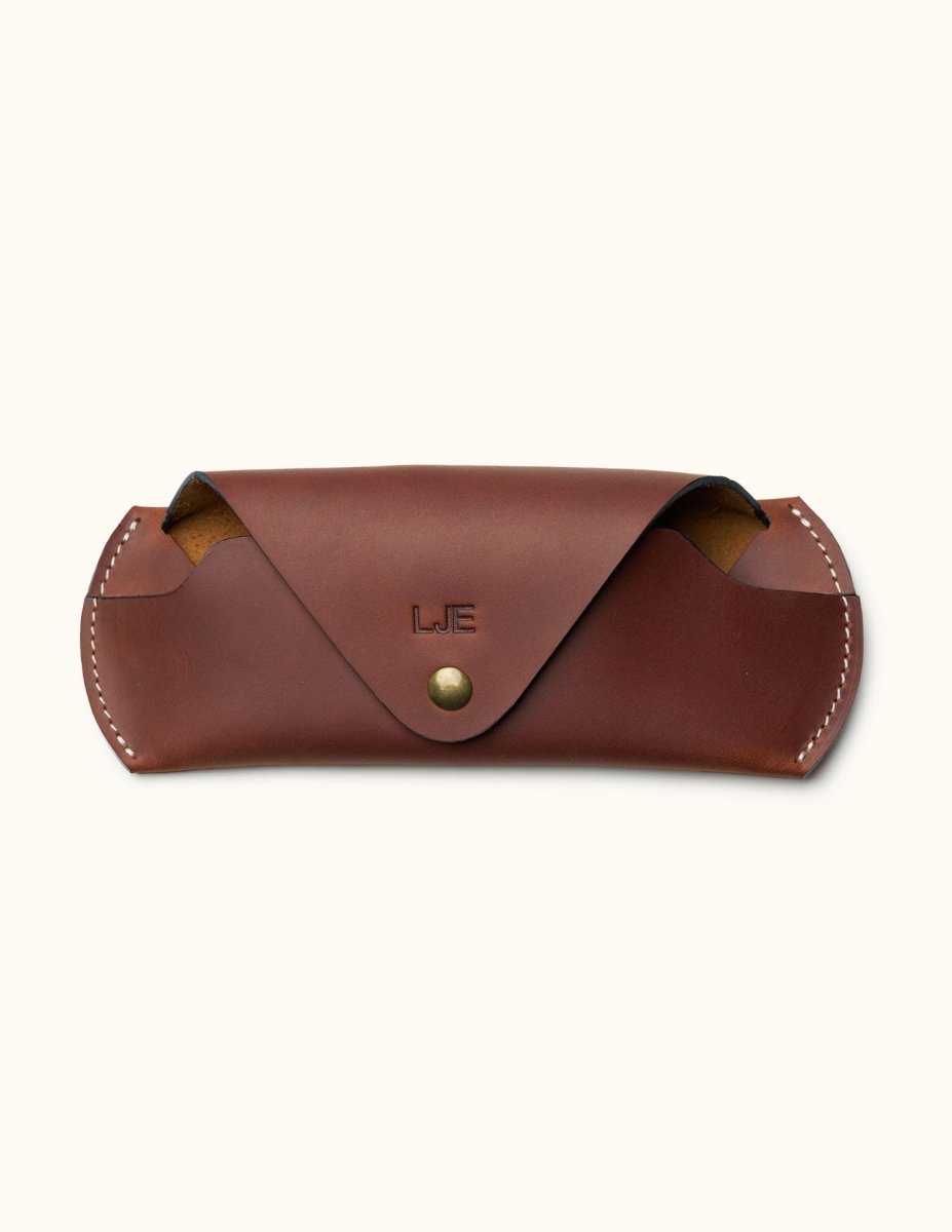 Front view of handmade brown Crazy Horse leather glasses case with snap button and personalized initials