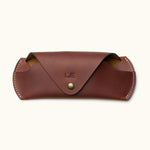 Front view of handmade brown Crazy Horse leather glasses case with snap button and personalized initials