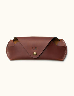 Front view of handmade brown Crazy Horse leather glasses case with snap button and personalized initials