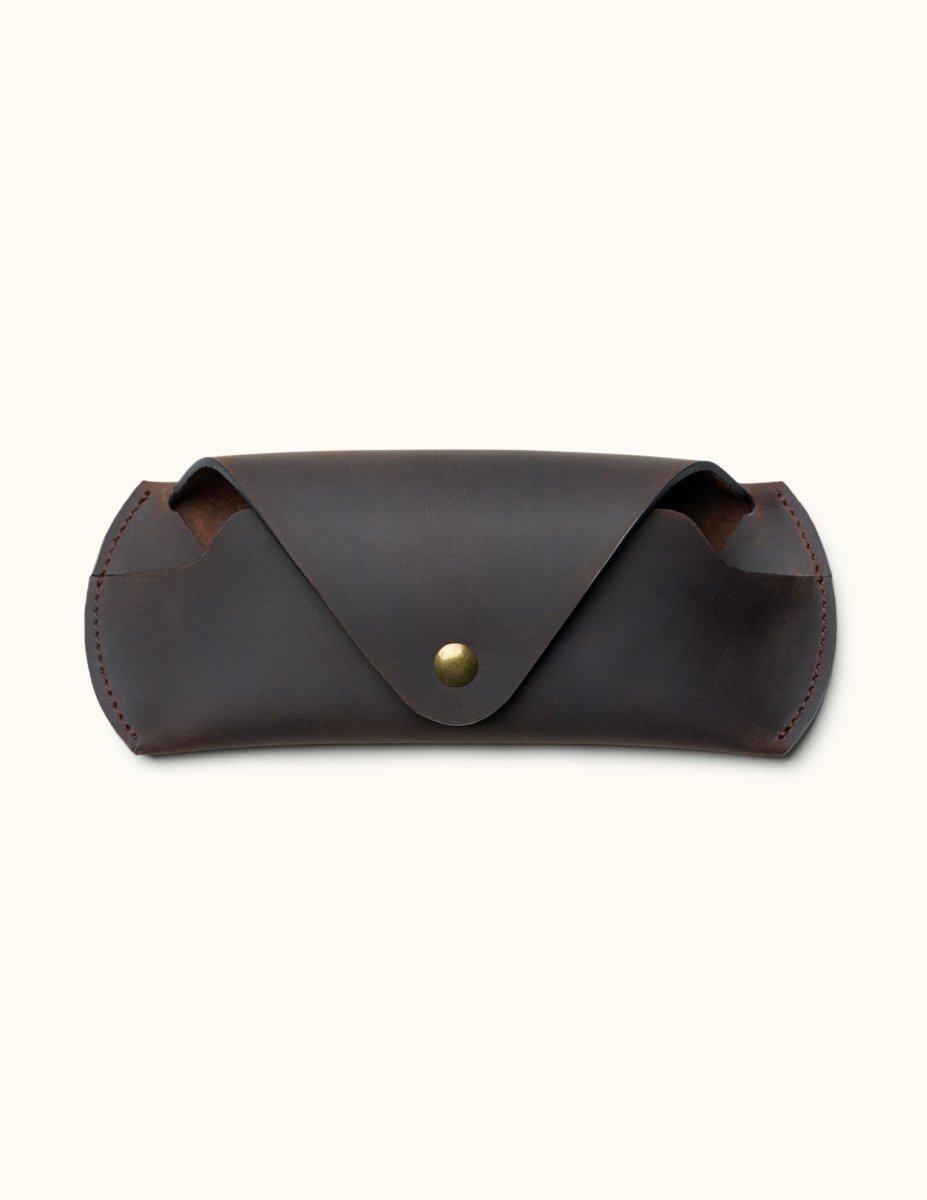 Closed view of handcrafted dark brown Crazy Horse leather sunglasses case with snap button closure