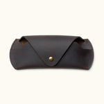 Closed view of handcrafted dark brown Crazy Horse leather sunglasses case with snap button closure