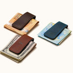 Three leather magnetic money clips in Vintage Brown, Navy, and Coffee – personalized cash holders for different currencies
