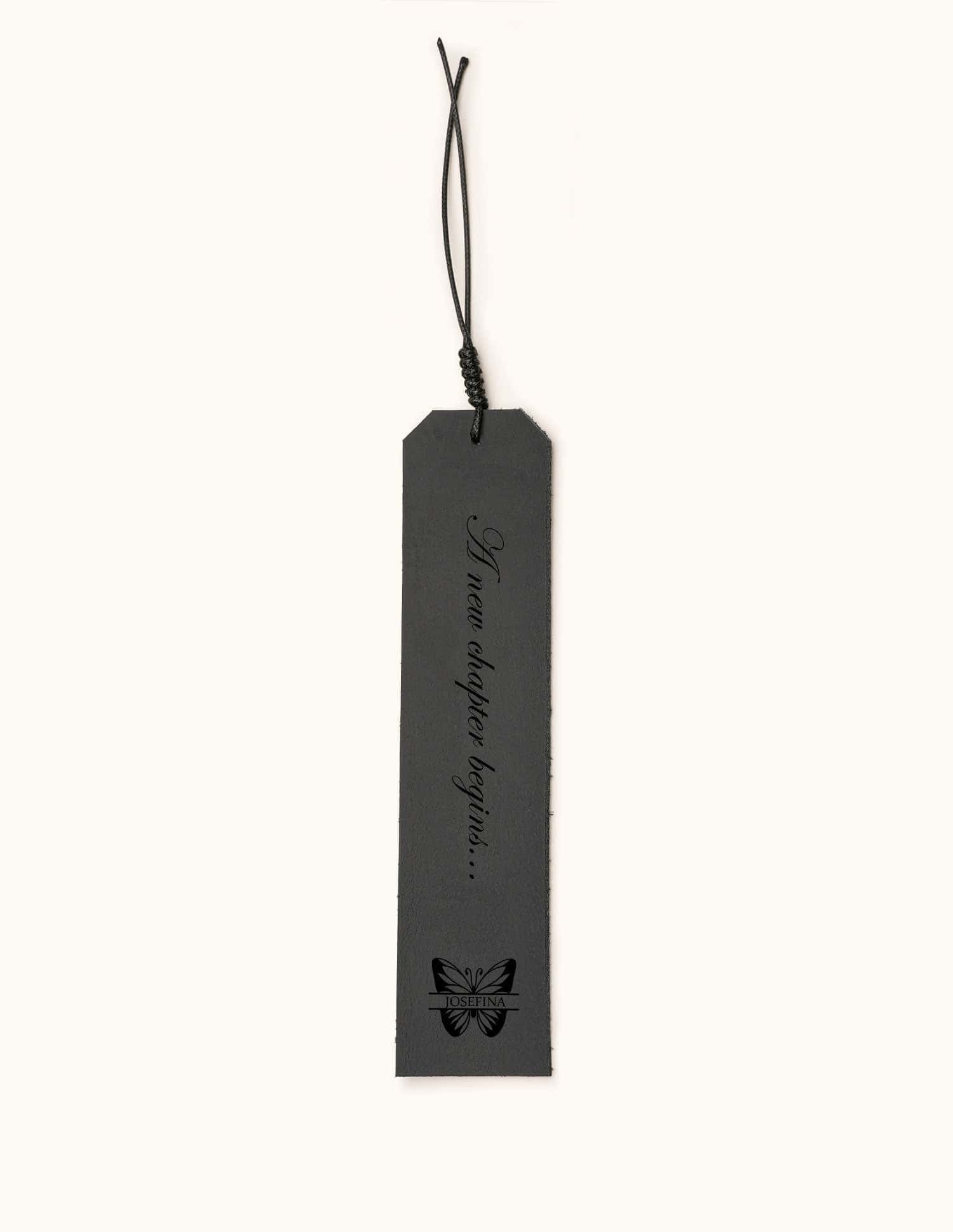 Five personalized leather bookmarks in different colors, each engraved with custom quotes, initials, or dates, with decorative tassel cords on top.