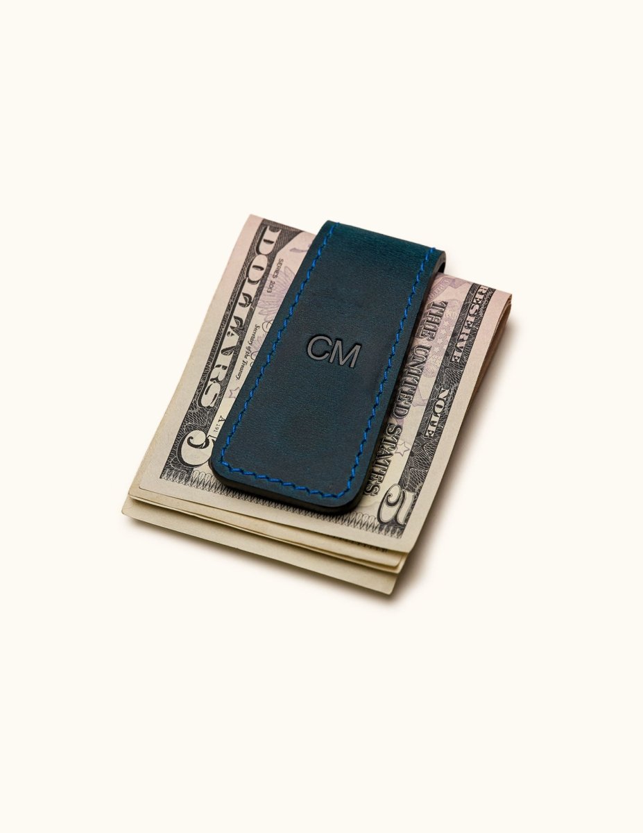 Navy blue leather magnetic money clip with engraved initials CM – stylish and compact cash holder
