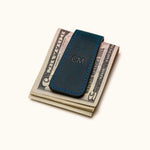 Navy blue leather magnetic money clip with engraved initials CM – stylish and compact cash holder