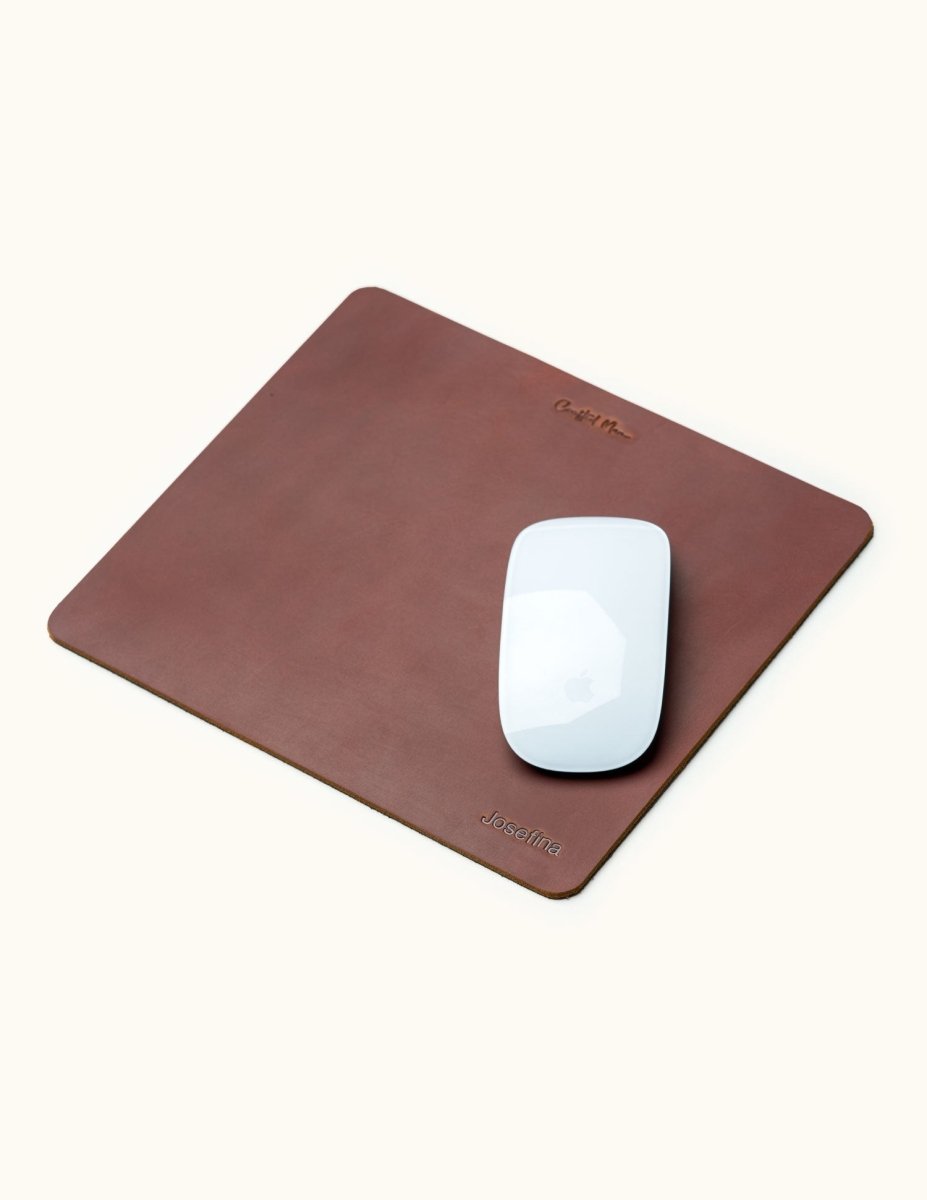 Small personalized leather mouse pad with name engraving and Apple Magic Mouse on top