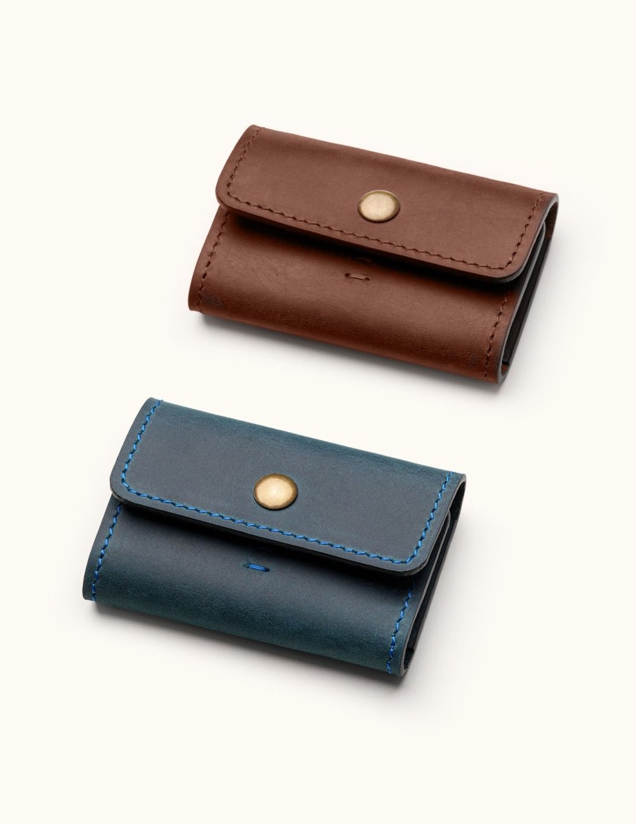 Open view of personalized full-grain leather SD card case with six stitched compartments for memory cards or Switch games