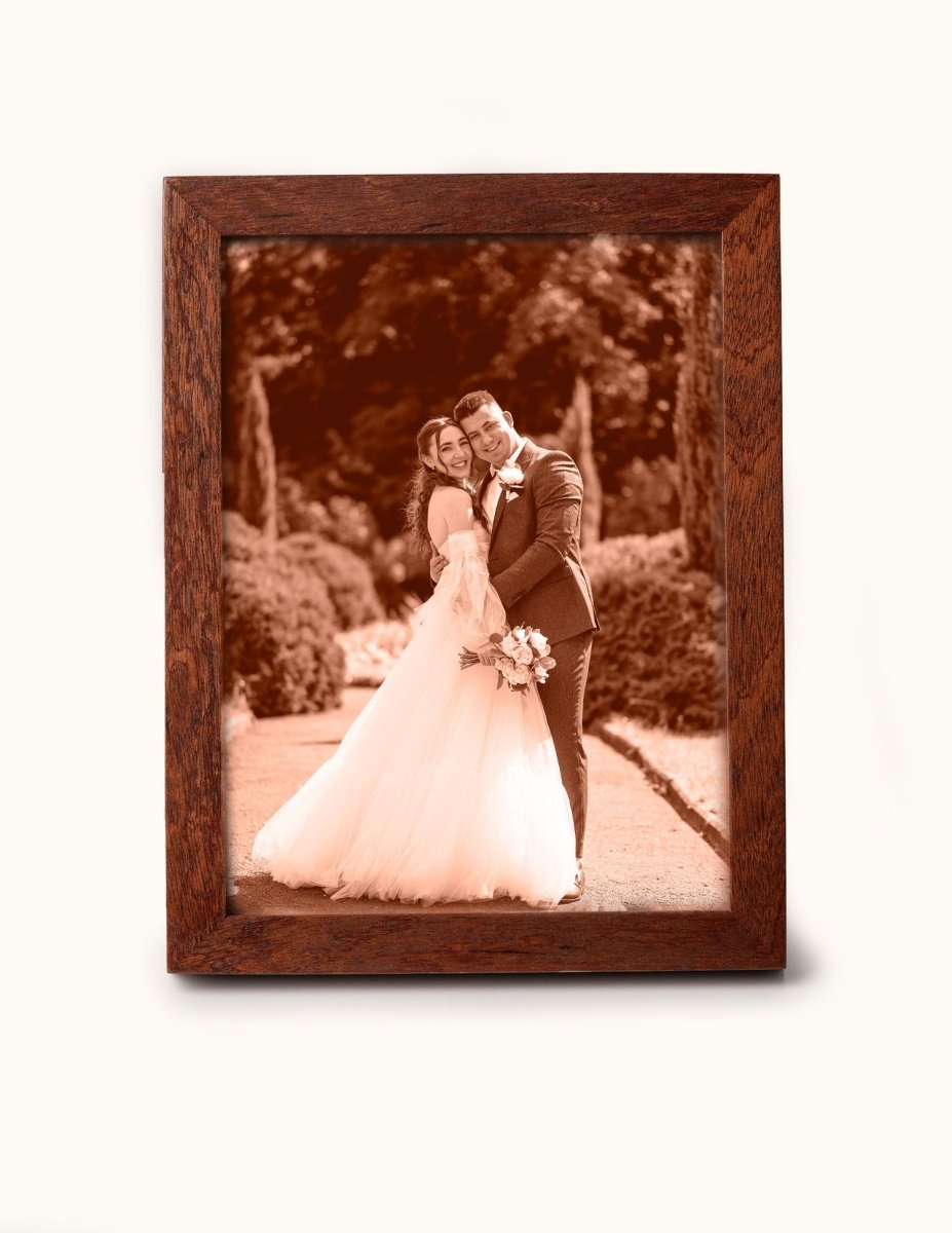Laser-engraved leather photo of a bride and groom on their wedding day, framed in wood — a timeless 3rd wedding anniversary gift