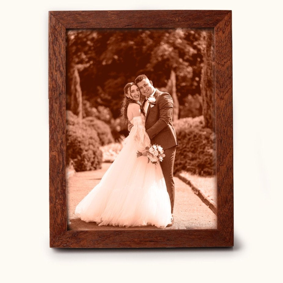 Laser-engraved leather photo of a bride and groom on their wedding day, framed in wood — a timeless 3rd wedding anniversary gift