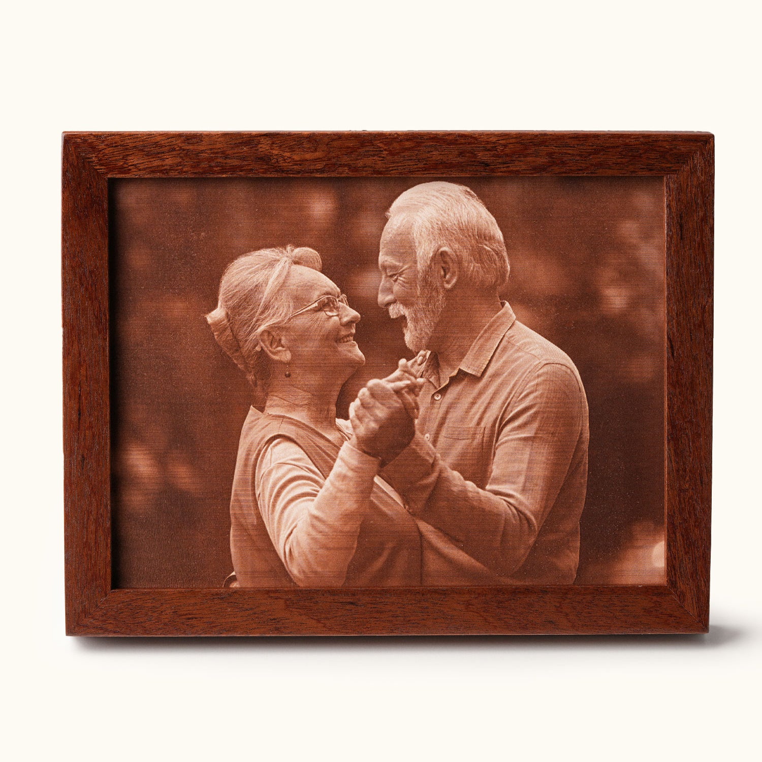 Laser-engraved leather portrait of a smiling couple dancing, framed in wood — a heartfelt 3rd wedding anniversary gift celebrating love and lasting memories