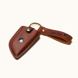 Brown leather BMW key holder with keyring and strap engraved with "Super Papa" and a heart symbol