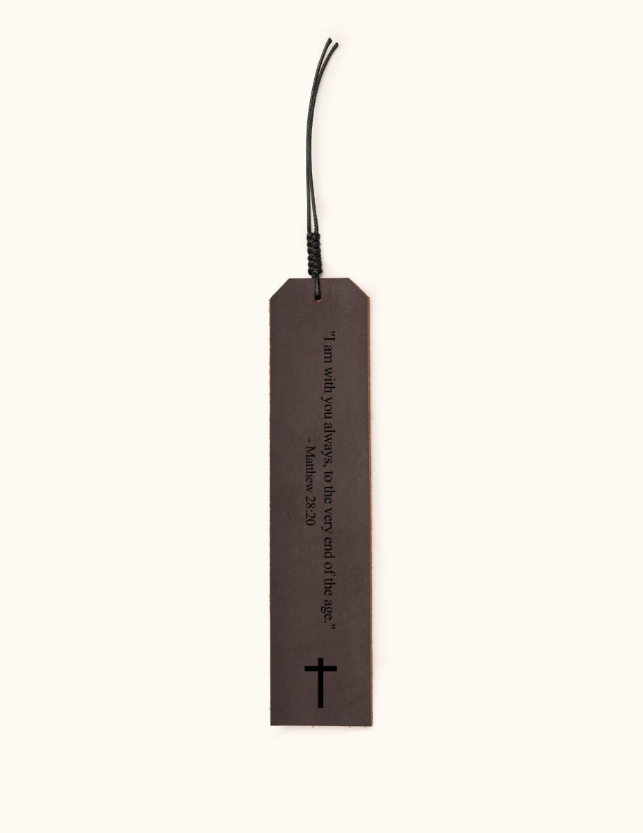Dark brown leather bookmark engraved with the Bible verse "I am with you always, to the very end of the age" - Matthew 28:20, and a cross symbol at the bottom
