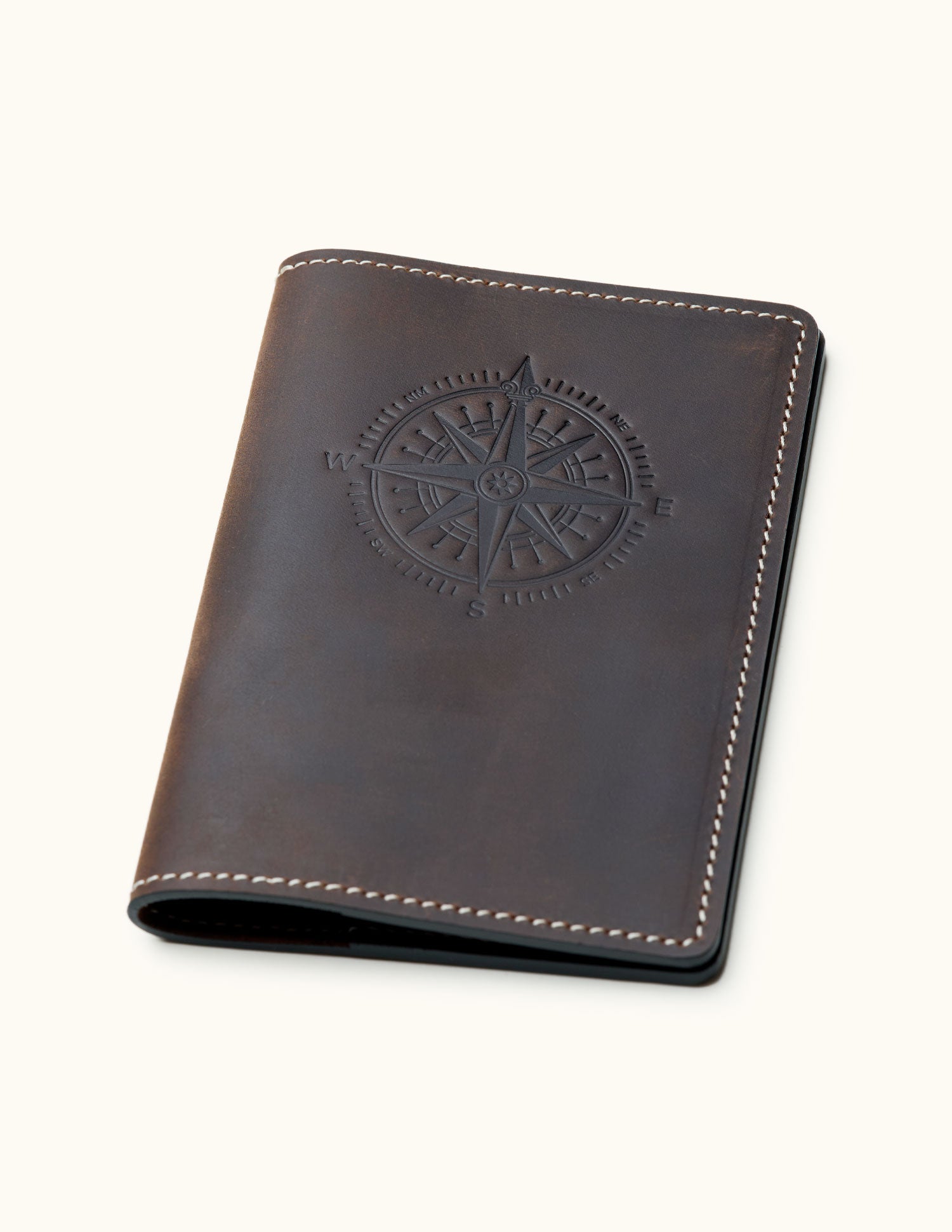 Coffee brown leather passport cover with compass rose embossed design – minimalist travel accessory for explorers