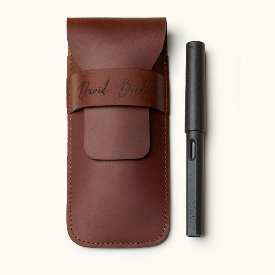 Personalized full-grain leather fountain pen case for three pens, handcrafted with stitched flap and custom engraving